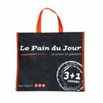 sac Le Pain du Jour noir et rouge en PP non tissé enduit